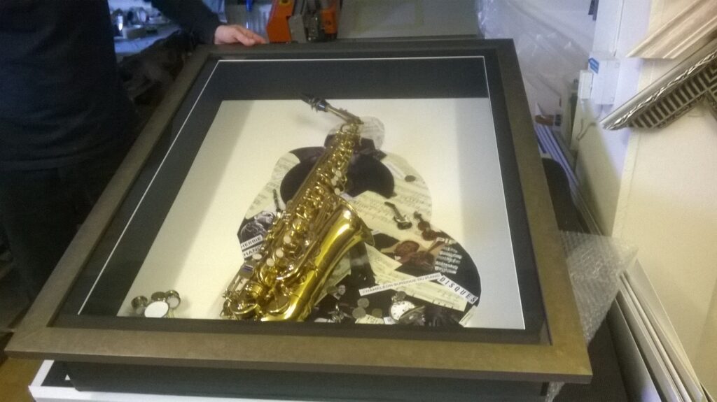 Box frame for saxophone